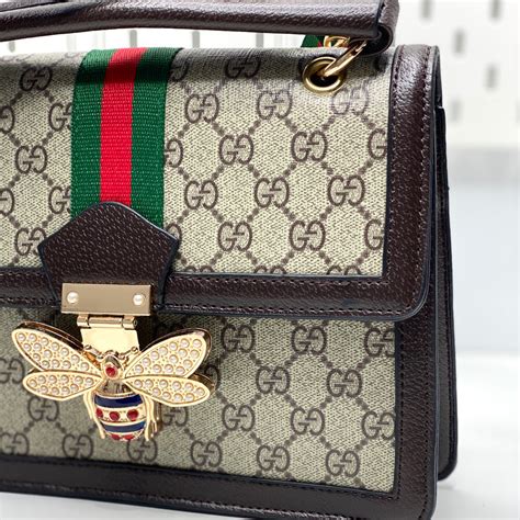 gucci bee clutch|Gucci handbags.